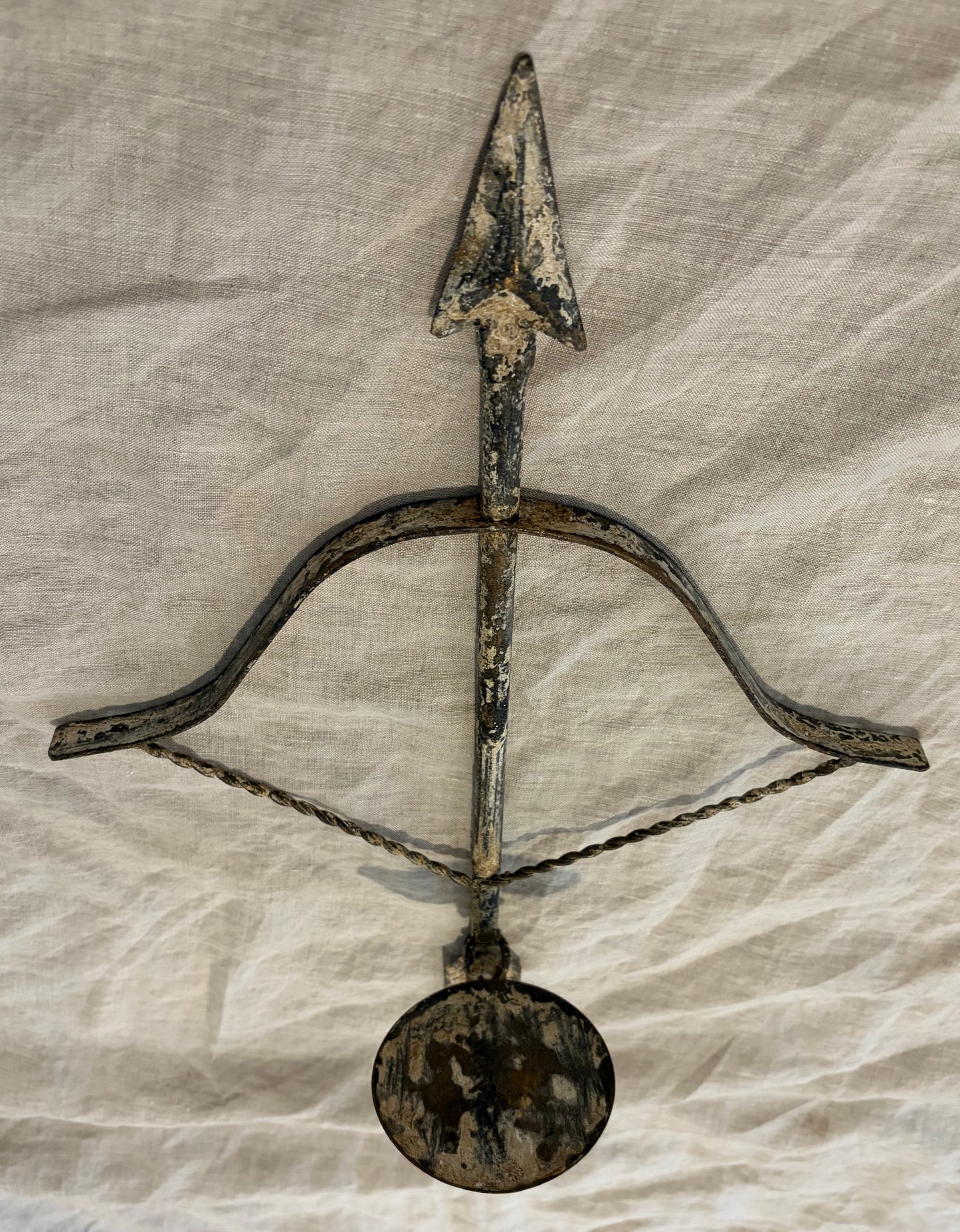 Pair of Patinated Tole Archer or Crossbow Form Candle Holders