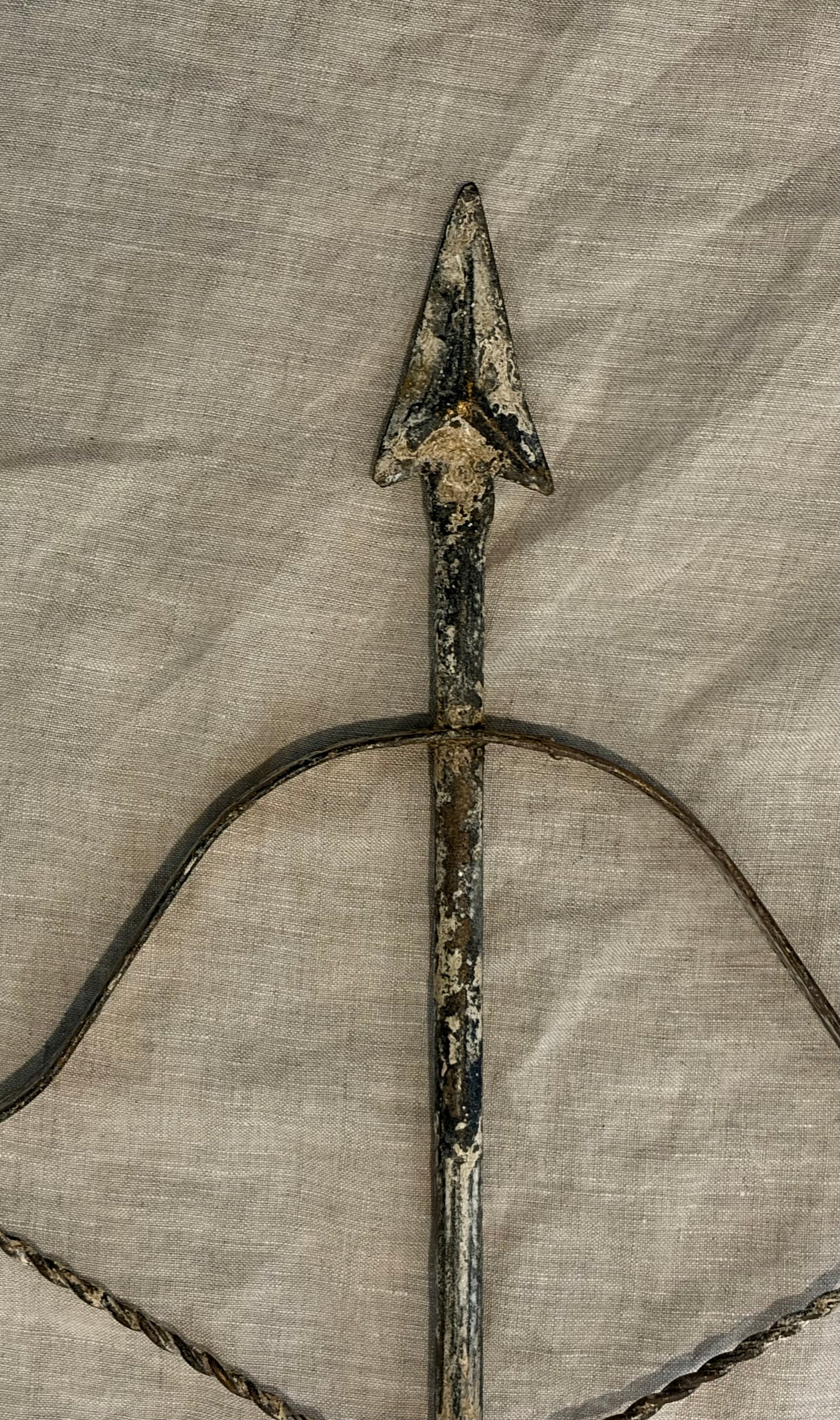 Pair of Patinated Tole Archer or Crossbow Form Candle Holders