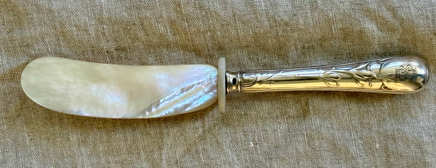 Mother of Pearl Spreader With Sterling Silver Handle.