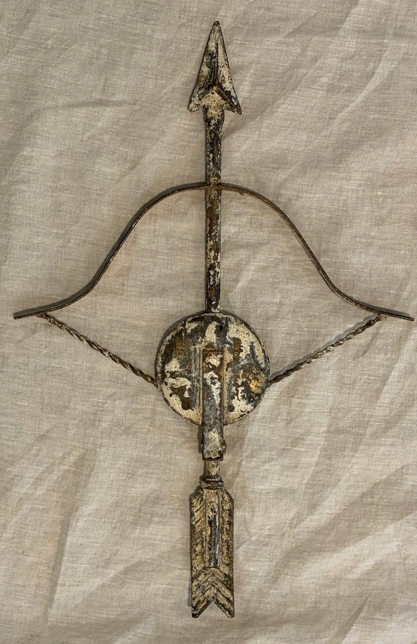 Pair of Patinated Tole Archer or Crossbow Form Candle Holders