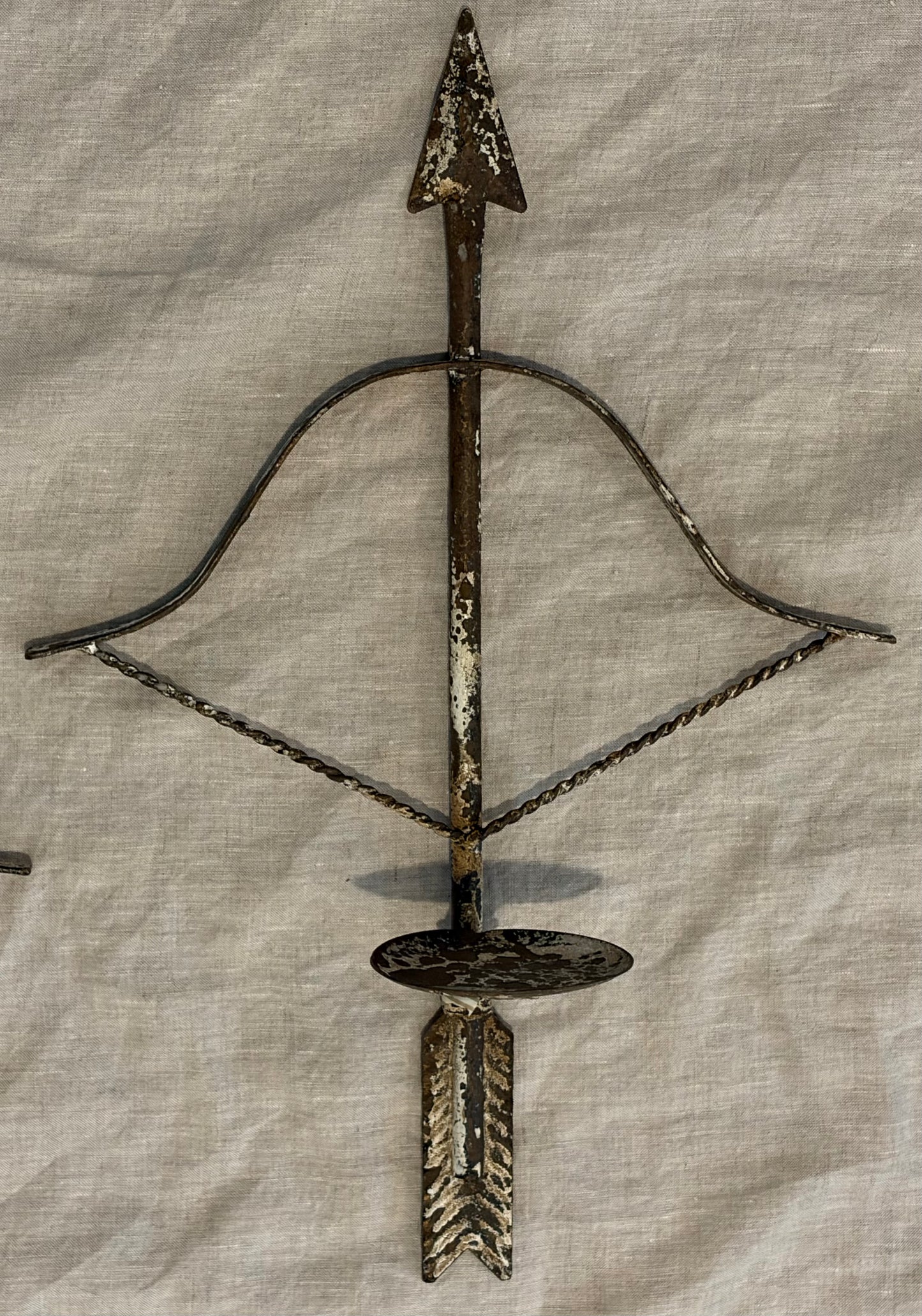 Pair of Patinated Tole Archer or Crossbow Form Candle Holders